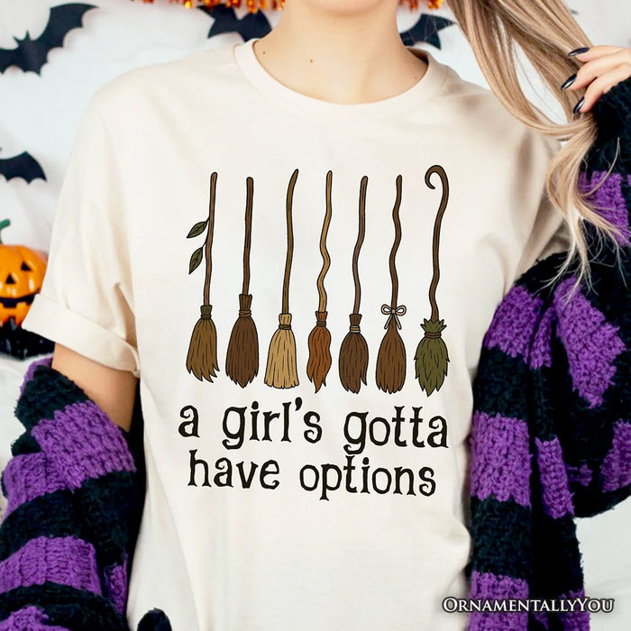 A Girl’s Gotta Have Options Witch T-Shirt, Funny Halloween Broomstick Tee for Witches T-Shirts OrnamentallyYou
