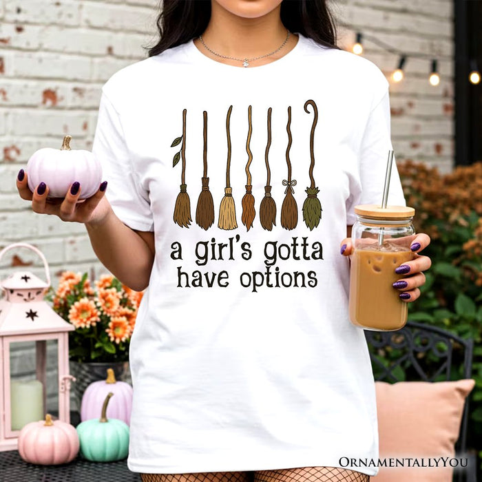 A Girl’s Gotta Have Options Witch T-Shirt, Funny Halloween Broomstick Tee for Witches T-Shirts OrnamentallyYou