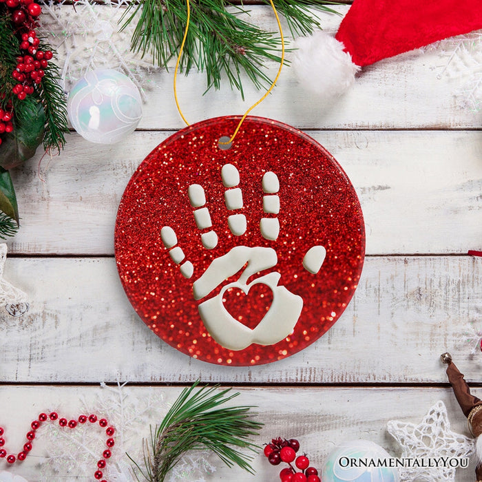 Baby Handprint in Red Glitter Themed Ornament, Christmas Nursery Keepsake and Tree Decor Ceramic Ornament OrnamentallyYou