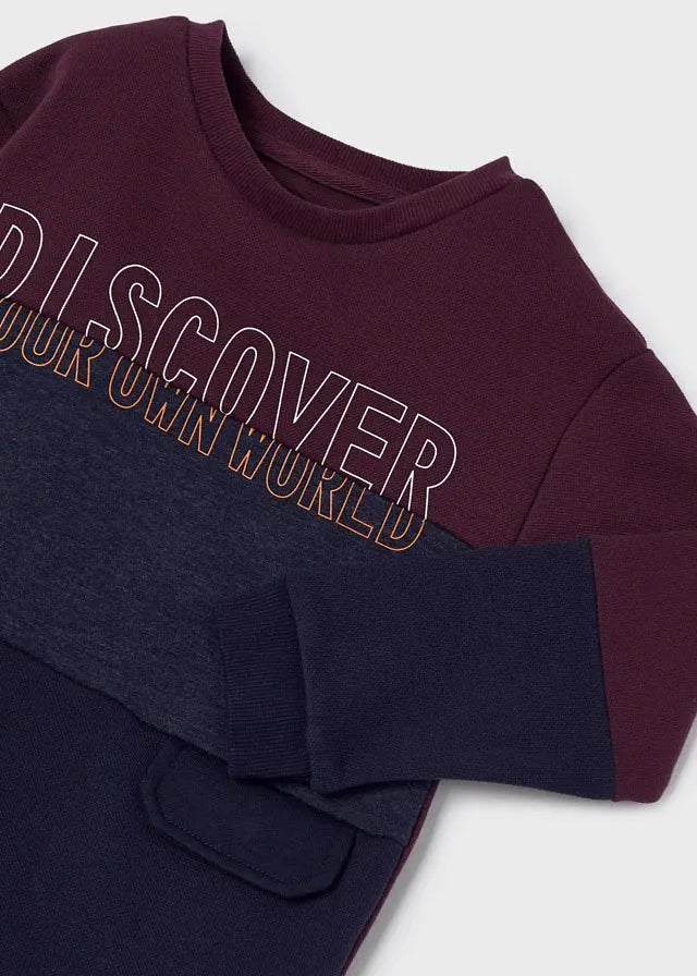Close view of Mayoral burgundy sweatshirt with graphic chest panel