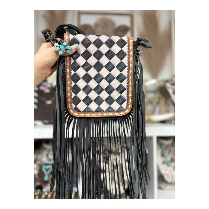 Checkered fringed leather bag