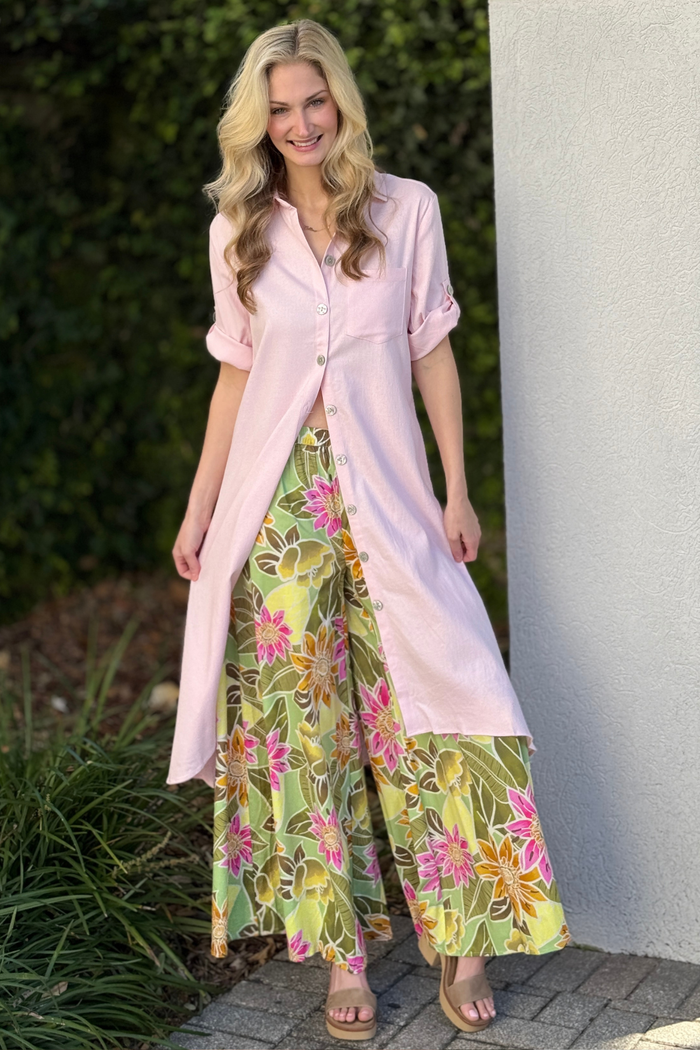Baby pink linen button down tunic front view styled with floral wide leg pants