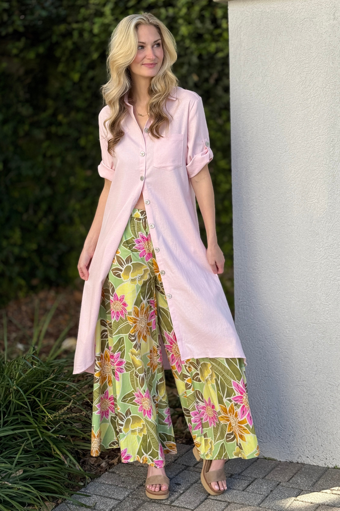 Baby pink longline linen tunic worn open as lightweight layering piece