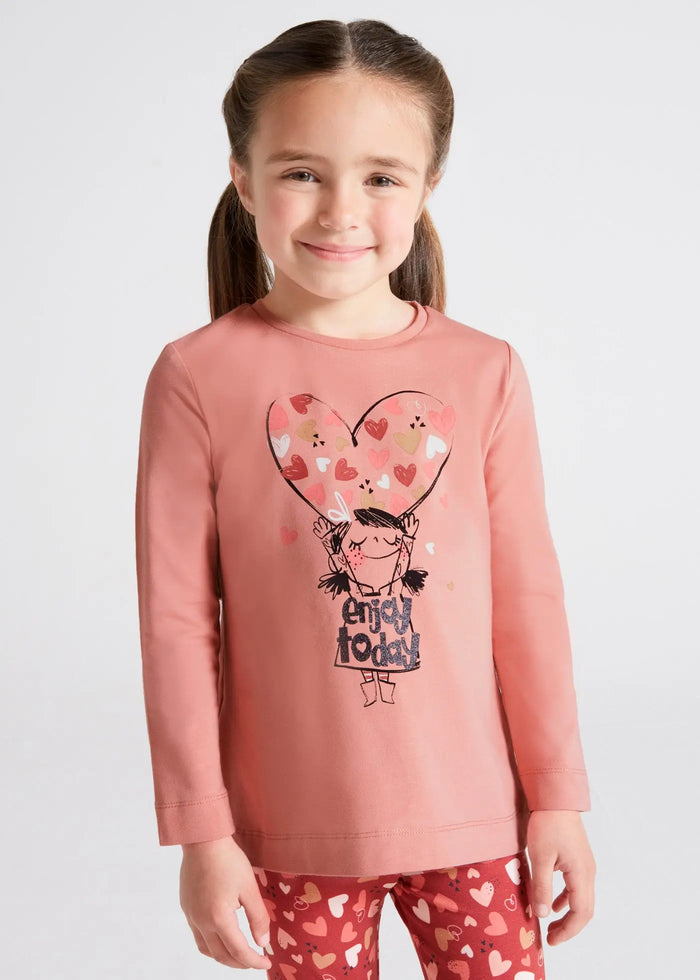 Girl wearing rosado pink Mayoral long-sleeve top with heart graphic