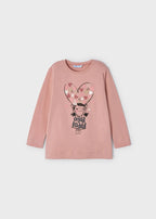 Front view of rosado pink Mayoral long-sleeve heart graphic top