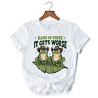 Hang In There It Gets Worse T-Shirt, White and Natural Funny Frog Tee with Dark Millennial Humor T-Shirts OrnamentallyYou