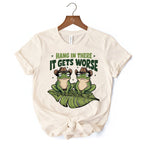Hang In There It Gets Worse T-Shirt, White and Natural Funny Frog Tee with Dark Millennial Humor T-Shirts OrnamentallyYou