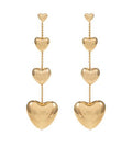 Gold-tone heart drop earrings featuring three cascading hearts on a delicate chain with hypoallergenic posts from The Pink Doxie Boutique.