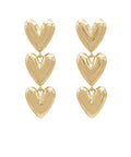 Triple puffy heart drop earrings in gold, silver, or vintage gold metal with post back closure from The Pink Doxie Boutique.