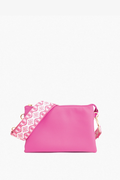 Hot pink Izzy crossbody bag with guitar strap