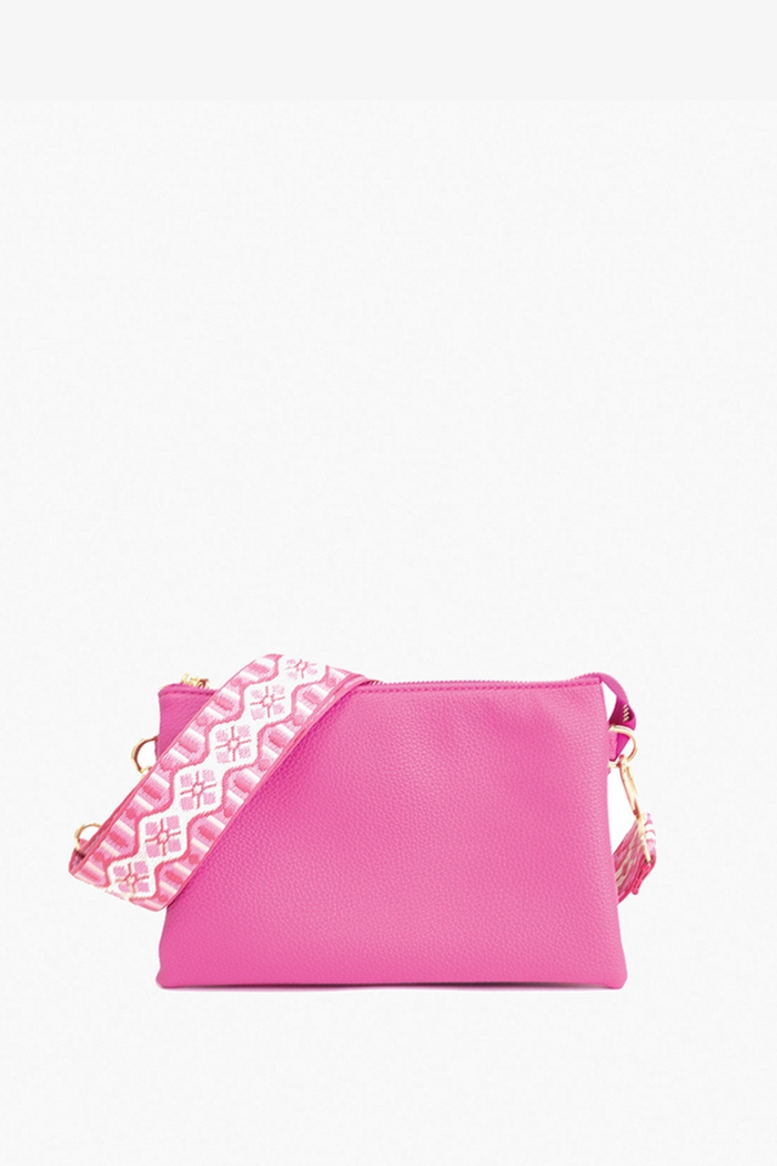 Hot pink Izzy crossbody bag with guitar strap