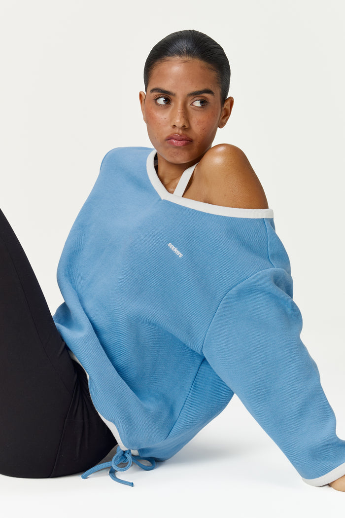 Model is 5'9" and wears a size S.