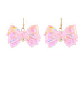 Acrylic pink ribbon bow earrings with faux pearl accent and fish hook closure from The Pink Doxie Boutique.