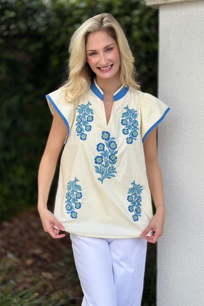 Flutter sleeve blouse with contrast stripe neckline