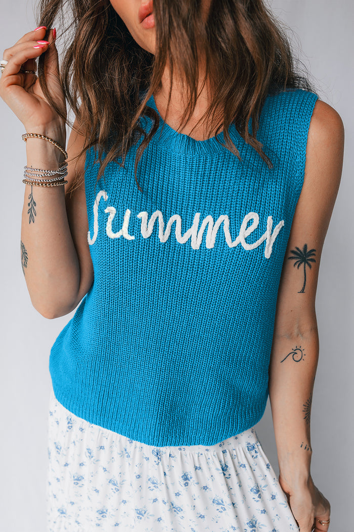 Teal blue sleeveless sweater vest with white “Summer” script graphic, lightweight knit top styled casually from The Pink Doxie Boutique.