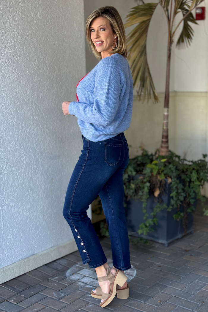 Luxury women’s slim fit jeans with side button detail
