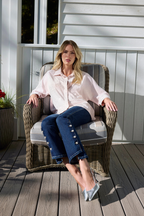High end boutique slim leg jeans styled for semi formal wear