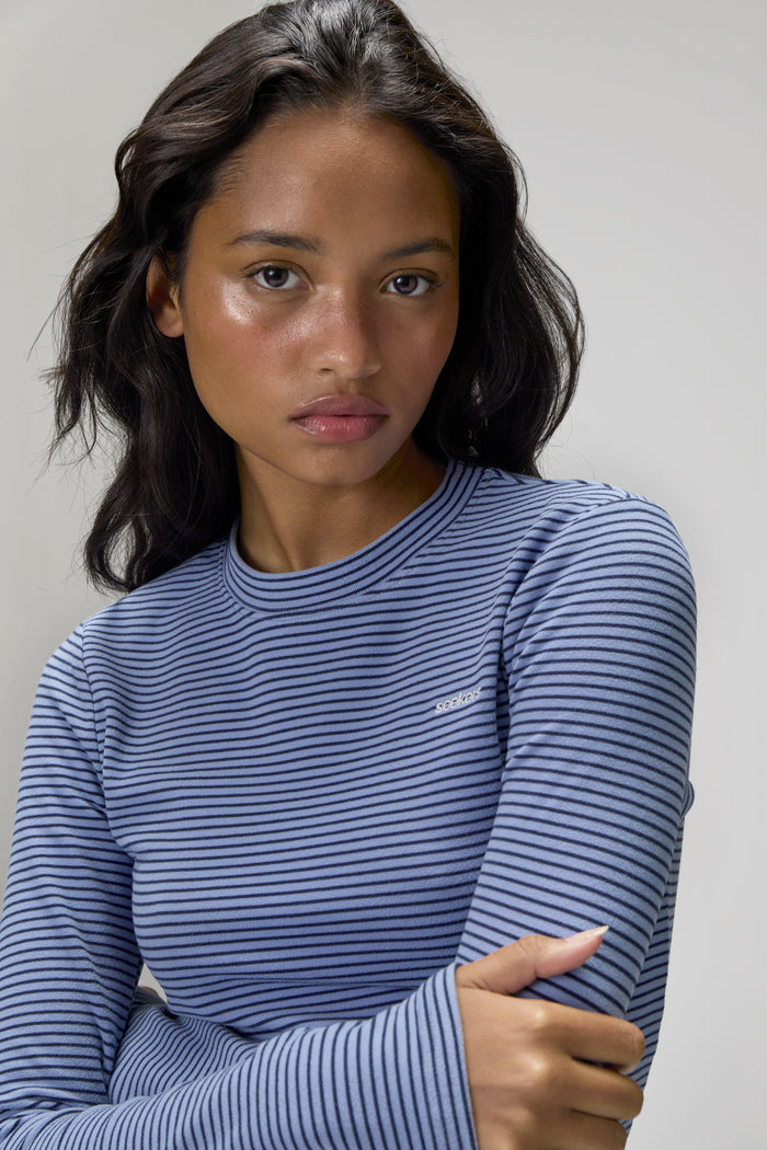 Model is 5'9" and wears a size S.